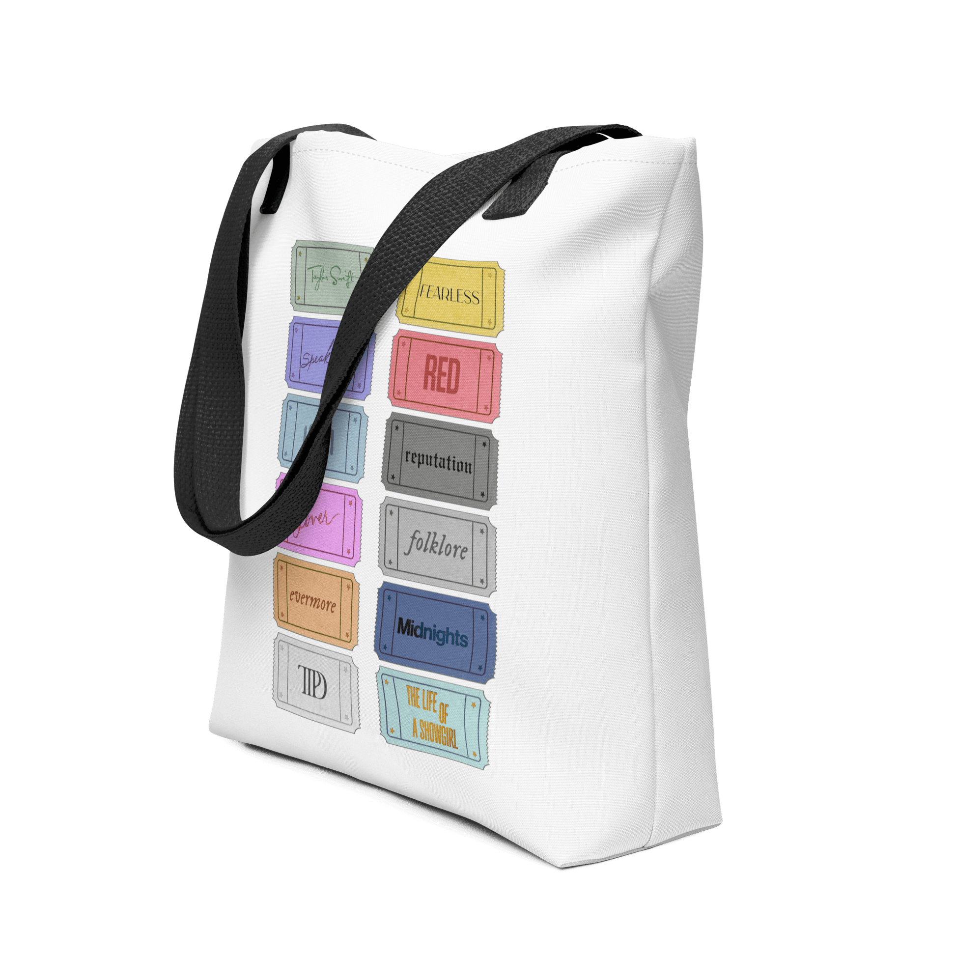 white Taylor 12 album shopping bag with all albums listed with black handles 
