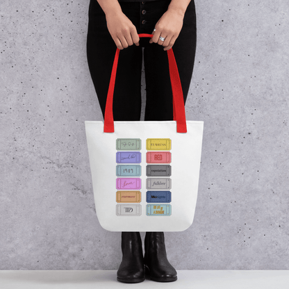 white Taylor 12 album shopping bag with all albums listed with red handles